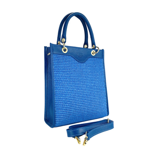 RB1026CH | Women's Vertical Handbag in Genuine Leather and Straw Made in Italy. Removable and adjustable leather shoulder strap. Polished Gold Accessories - Royal Blue Color - Dimensions: 24 x 29 x 9 cm